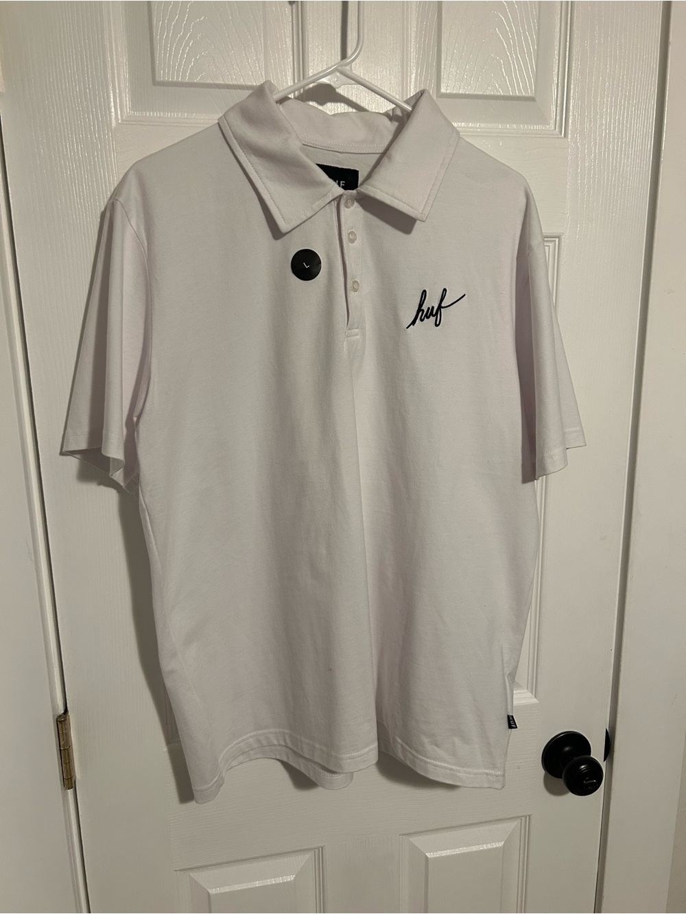 HUF White Polo with Black Script Logo